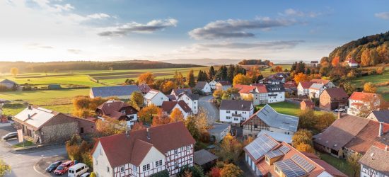 pexels photo 280221 Charming aerial view of a rural village in autumn with vivid colors and clear skies.